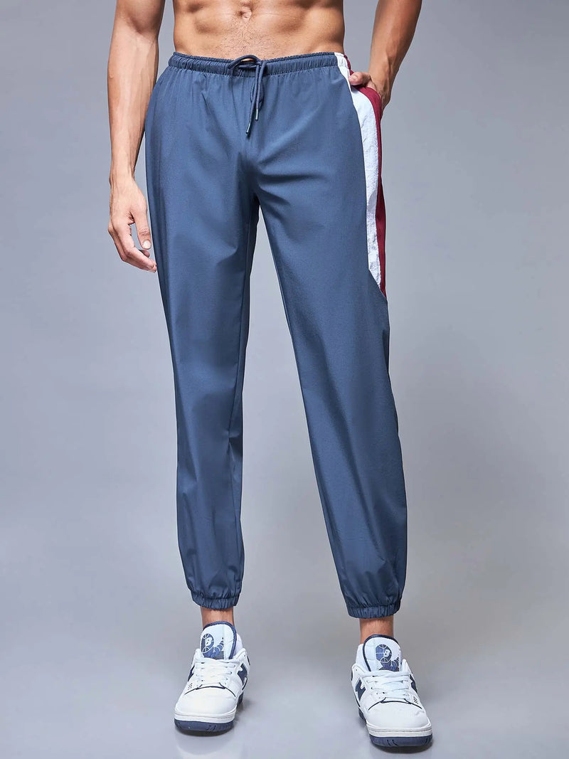 Blue Windbreaker joggers CAVA athleisure