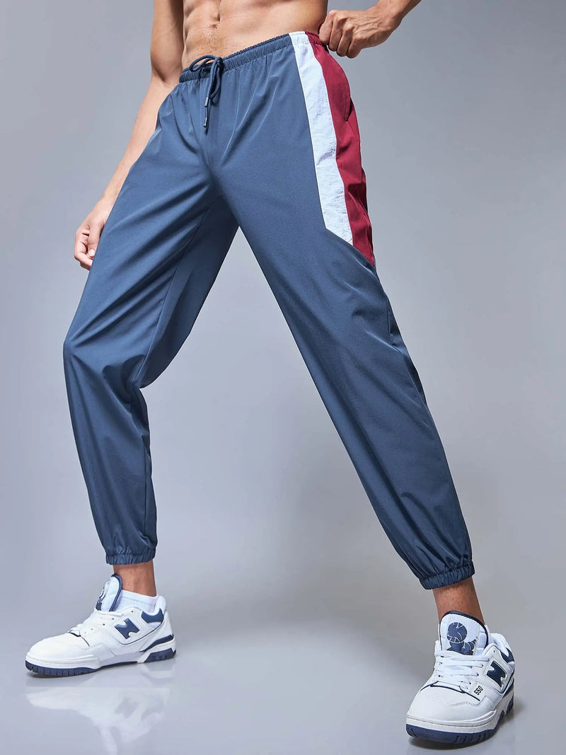 Blue Windbreaker joggers CAVA athleisure